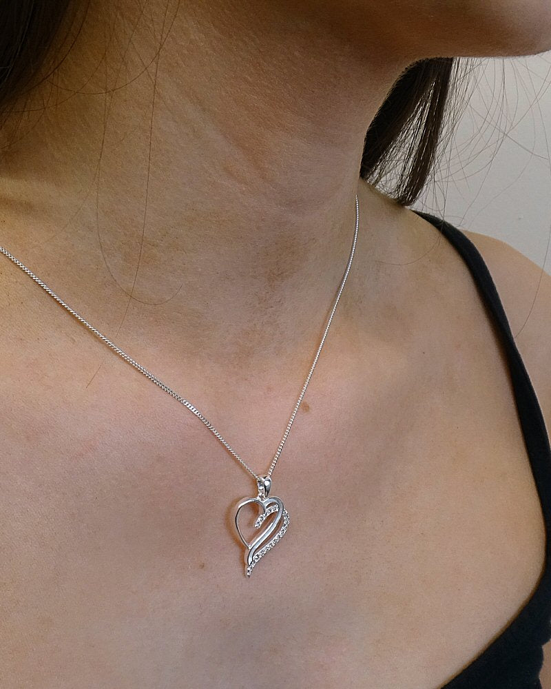 Cremation ash/hair double heart pendant.