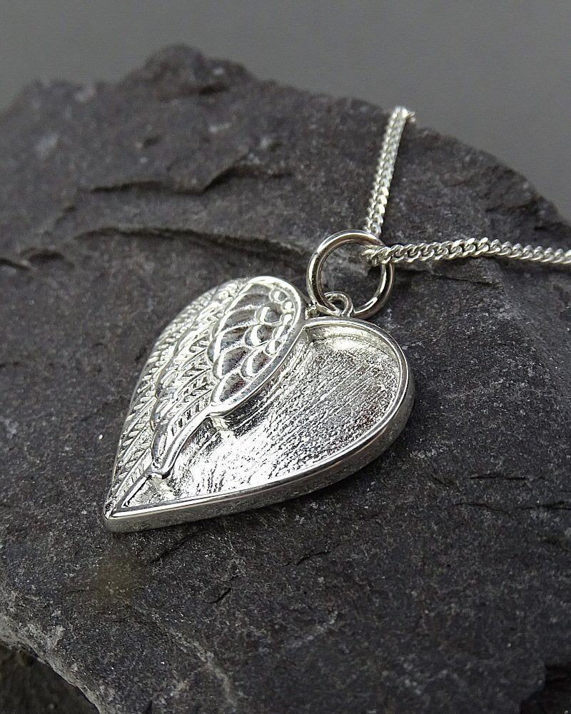 Winged angel heart pendant