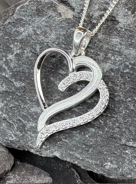 Cremation ash/hair double heart pendant.