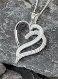 Cremation ash/hair double heart pendant.