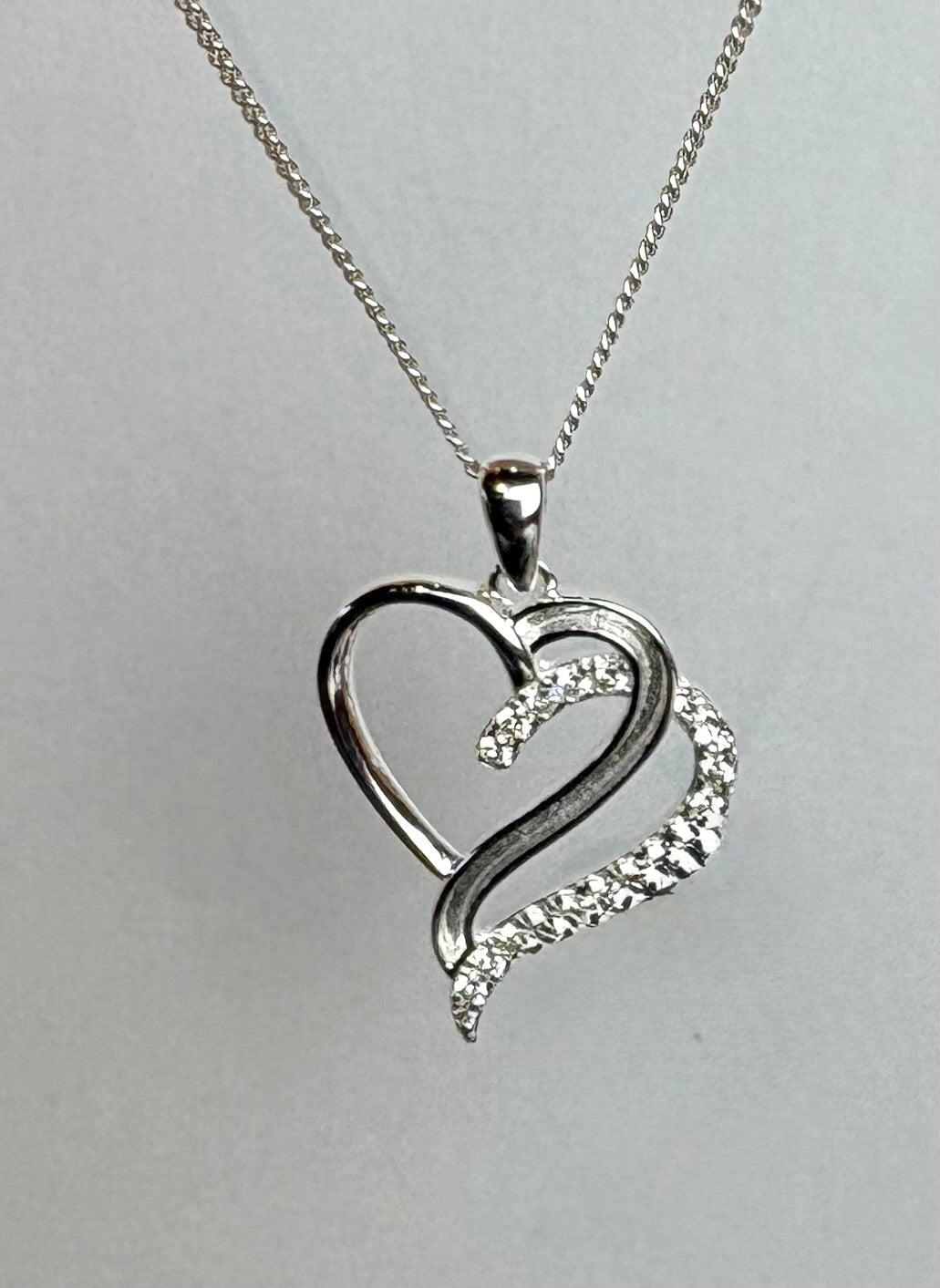 Cremation ash/hair double heart pendant.